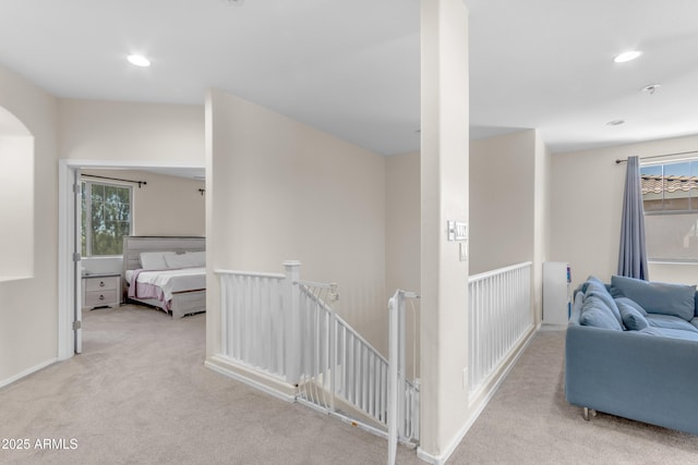 27053 N 172nd Ln, Surprise, AZ 85387 - corridor featuring an upstairs landing, carpet flooring, recessed lighting, and arched walkways