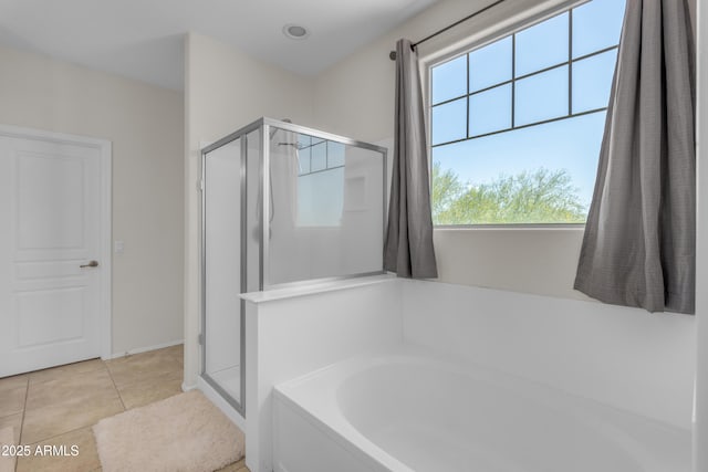27053 N 172nd Ln, Surprise, AZ 85387 - full bath featuring a stall shower, a garden tub, and tile patterned floors