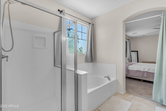 27053 N 172nd Ln, Surprise, AZ 85387 - full bathroom featuring a stall shower, a bath, connected bathroom, and tile patterned flooring