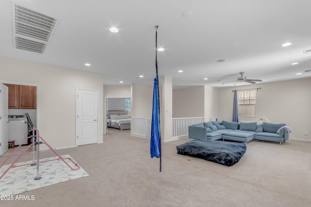 27053 N 172nd Ln, Surprise, AZ 85387 - living area featuring washer / dryer, light colored carpet, recessed lighting, and a ceiling fan