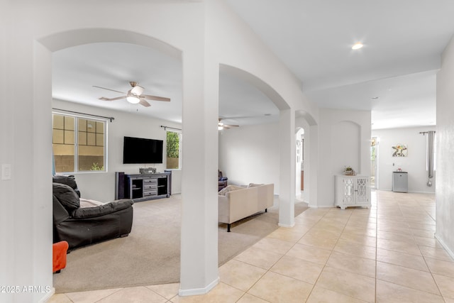 27053 N 172nd Ln, Surprise, AZ 85387 - tiled living room featuring ceiling fan, arched walkways, and recessed lighting