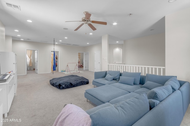 27053 N 172nd Ln, Surprise, AZ 85387 - living room with light carpet, ceiling fan, and recessed lighting