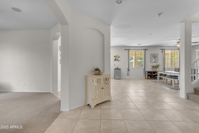 27053 N 172nd Ln, Surprise, AZ 85387 - hall with arched walkways, stairs, and light tile patterned floors
