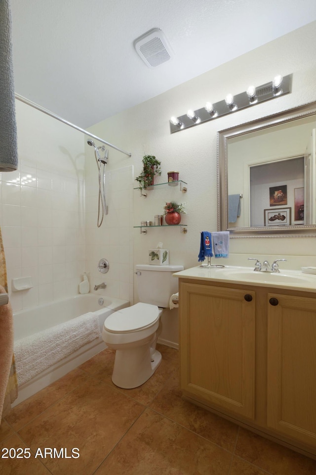 bathroom with visible vents, shower / washtub combination, toilet, tile patterned floors, and vanity