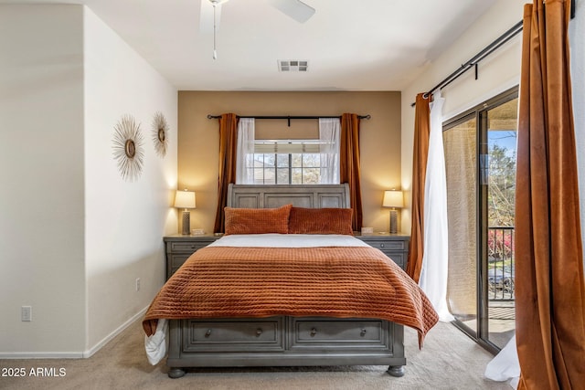 carpeted bedroom featuring access to exterior, baseboards, visible vents, and a ceiling fan