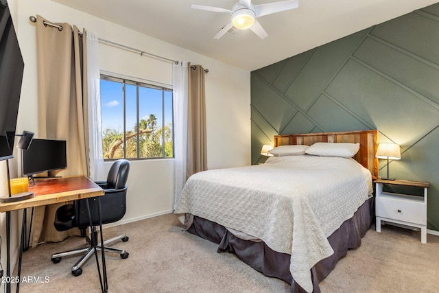 bedroom featuring carpet floors, a ceiling fan, and baseboards