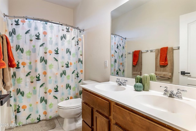 full bath featuring tile patterned flooring, a sink, toilet, and double vanity