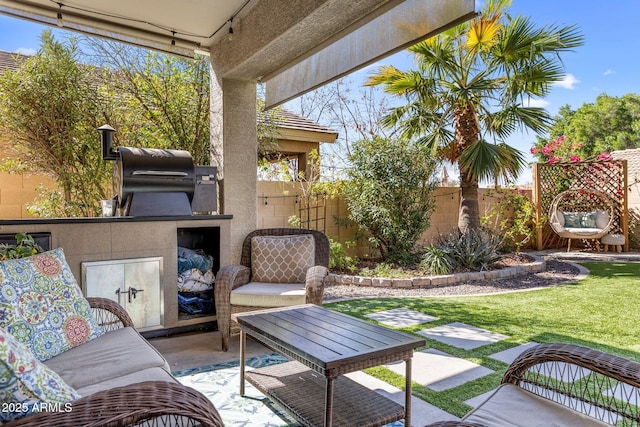 view of patio with a grill, fence, and outdoor lounge area