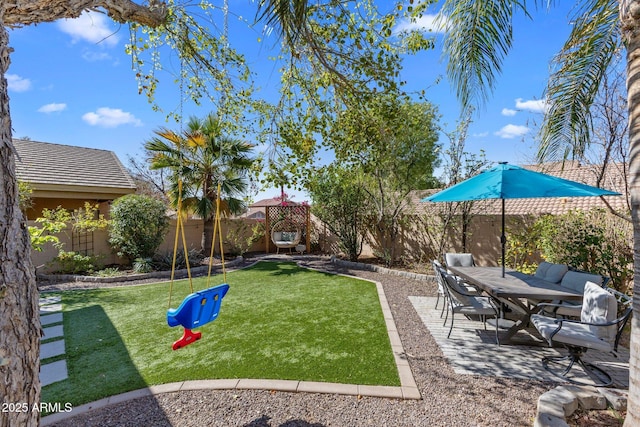 view of yard with a patio area and a fenced backyard