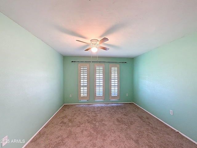 1553 E Flower Cir, Mesa, AZ 85204 - carpeted spare room with a ceiling fan and baseboards