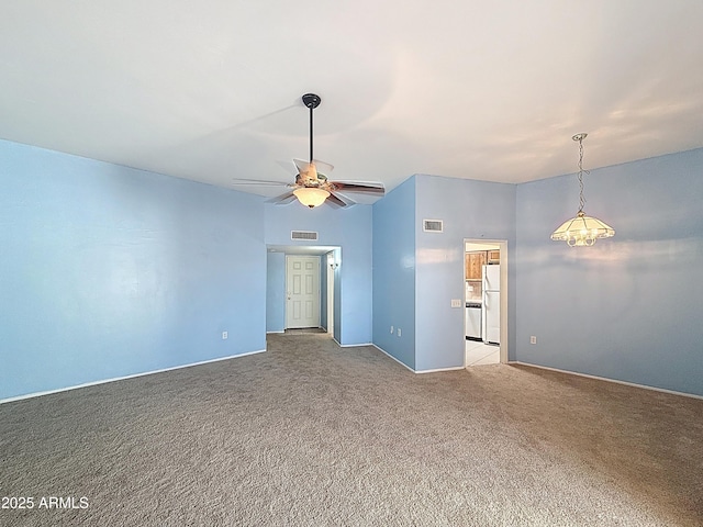 1553 E Flower Cir, Mesa, AZ 85204 - carpeted spare room featuring ceiling fan and baseboards