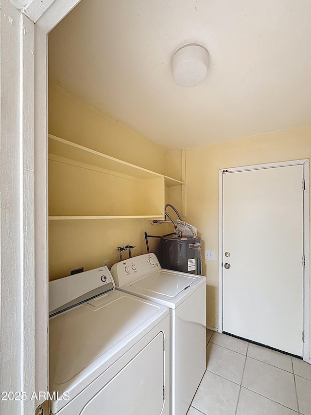 1553 E Flower Cir, Mesa, AZ 85204 - laundry room with water heater, washing machine and clothes dryer, and light tile patterned floors