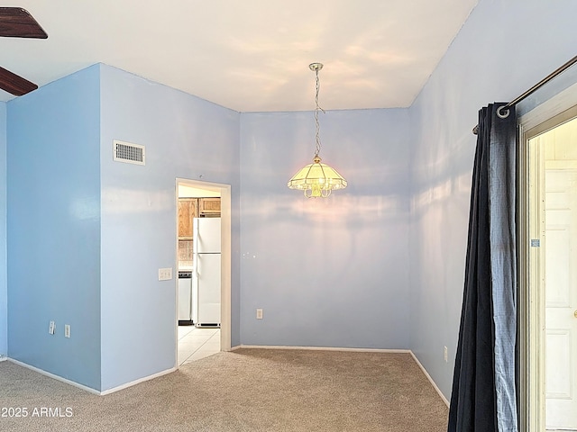 1553 E Flower Cir, Mesa, AZ 85204 - spare room with light colored carpet, a chandelier, and baseboards
