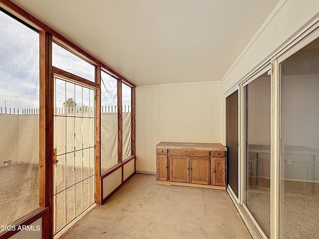 1553 E Flower Cir, Mesa, AZ 85204 - unfurnished sunroom featuring concrete floors