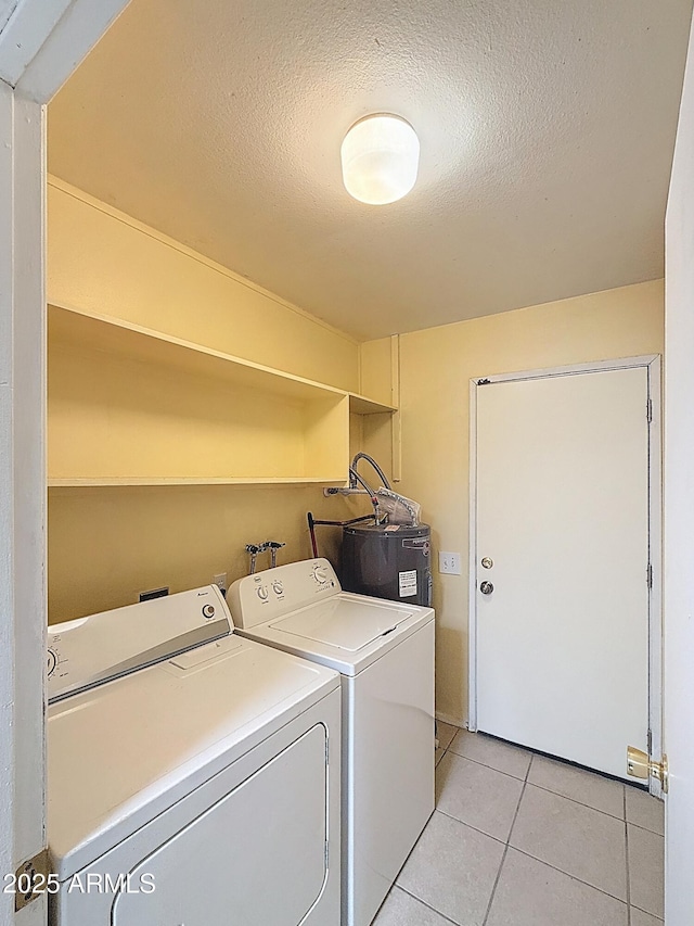 1553 E Flower Cir, Mesa, AZ 85204 - laundry room featuring water heater, independent washer and dryer, light tile patterned flooring, and a textured ceiling