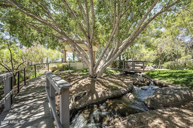 view of community with a water view