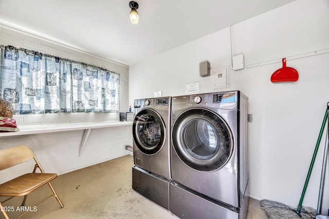 laundry room featuring laundry area and washing machine and dryer