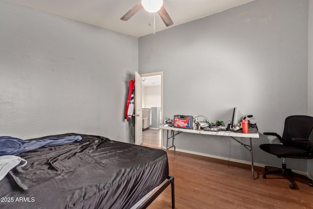 bedroom with hardwood / wood-style flooring and ceiling fan