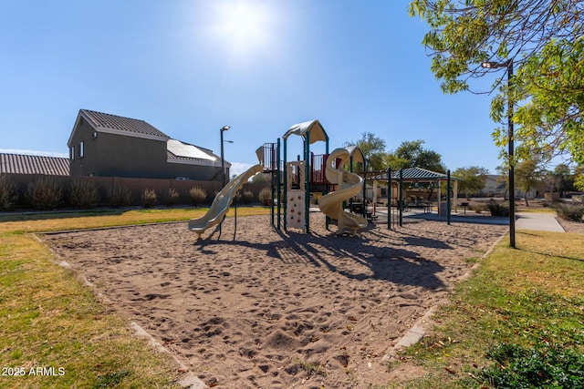 view of jungle gym featuring a yard