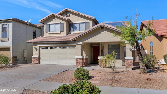 view of front of home with a garage