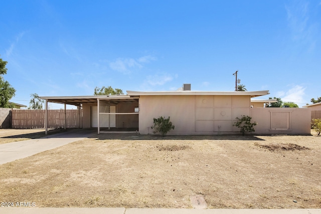 view of front of house featuring a carport