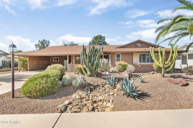 single story home with a garage