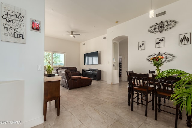 dining room featuring ceiling fan