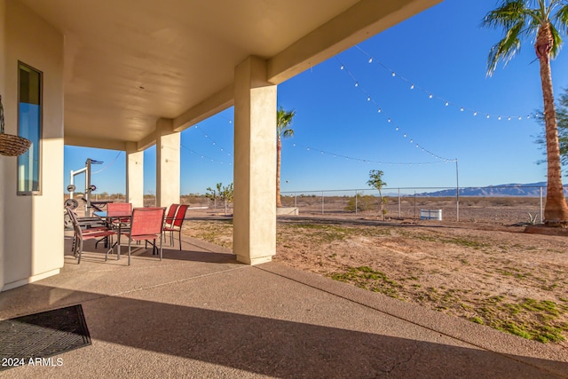 view of patio with a mountain view