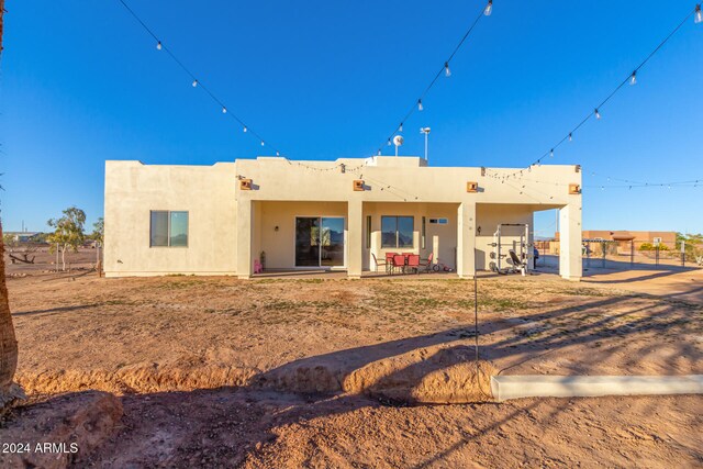 back of house featuring a patio area