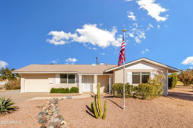 single story home featuring a garage