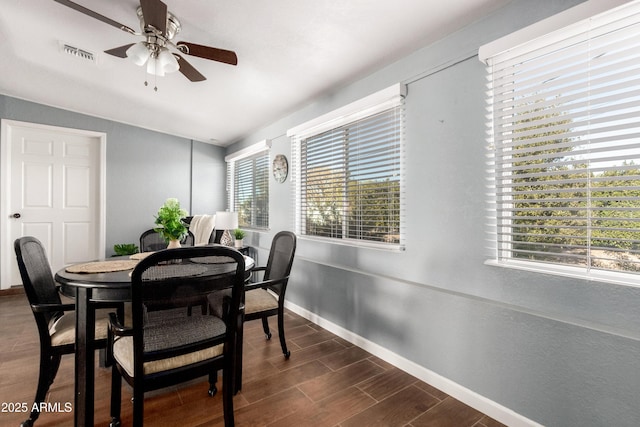 dining room featuring lofted ceiling and ceiling fan