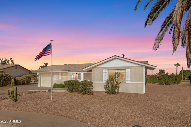 view of front of home with a garage