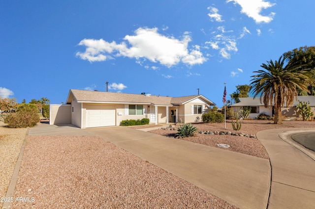 ranch-style home with a garage