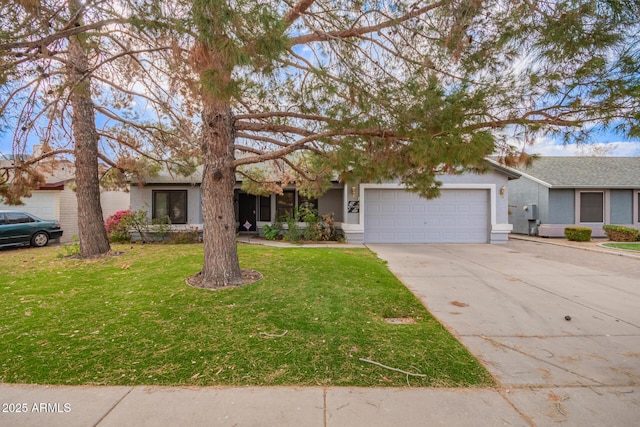 ranch-style house featuring a garage and a front yard