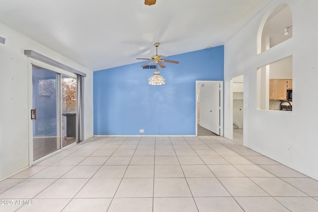 tiled empty room featuring high vaulted ceiling and ceiling fan