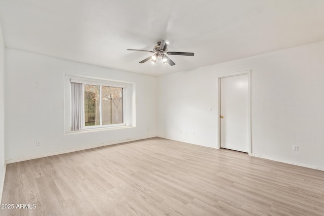 unfurnished room with light hardwood / wood-style floors and ceiling fan