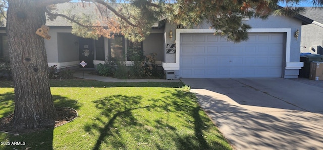 view of front of house featuring a garage and a front yard