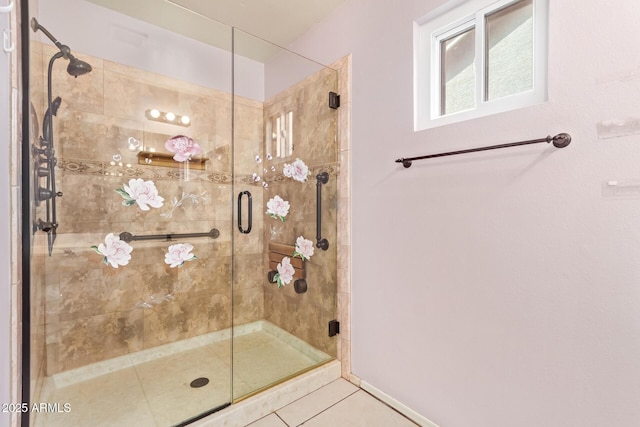 bathroom featuring walk in shower and tile patterned flooring