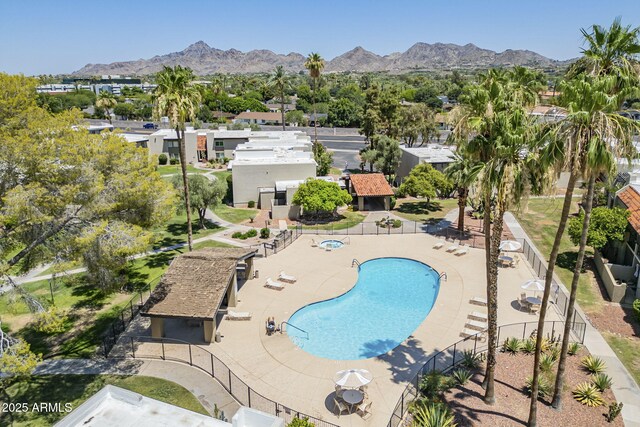 4201 E Camelback Rd Unit 74, Phoenix, AZ 85018 - community pool with a mountain view, a patio area, and a residential view
