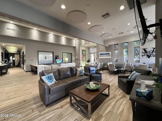 19777 N 76th St Unit 3229, Scottsdale, AZ 85255 - living room with light wood-style flooring and recessed lighting