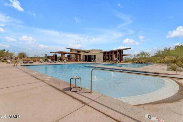 9815 S 11th St, Phoenix, AZ 85042 - community pool featuring a patio area