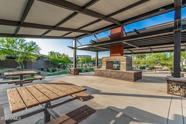9815 S 11th St, Phoenix, AZ 85042 - view of patio featuring a glass covered fireplace