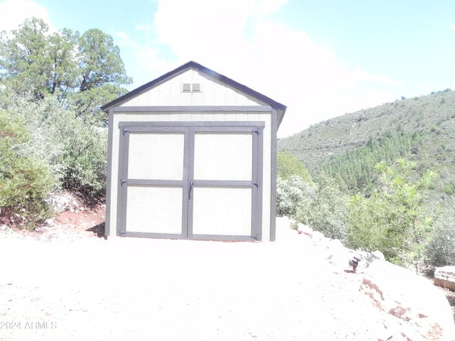 view of outdoor structure featuring a mountain view