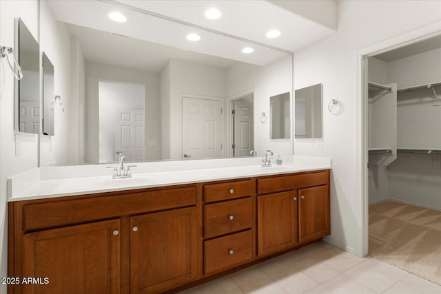 bathroom featuring tile patterned floors and vanity