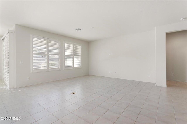 view of tiled spare room