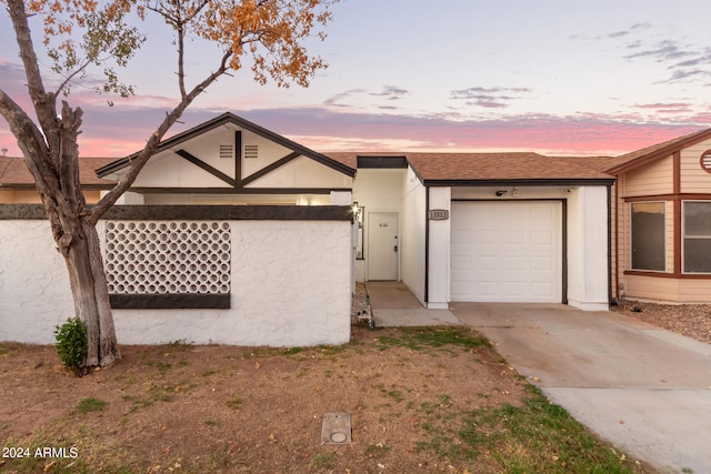 single story home with a garage