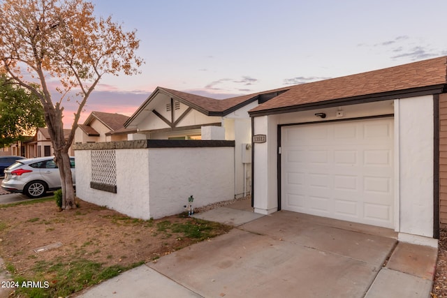 exterior space with a garage