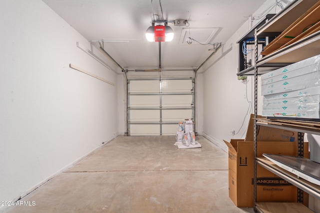 garage featuring a garage door opener