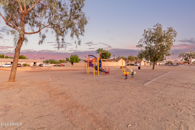 view of playground at dusk