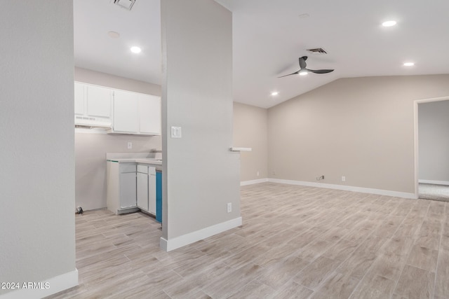 interior space featuring ceiling fan, vaulted ceiling, and light hardwood / wood-style floors